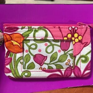 NWOT Vera Bradley Pink and Green Floral Coins Wallet
Length 5
Height 3